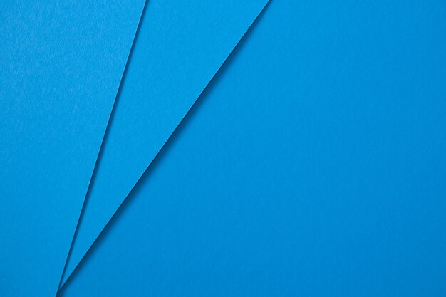 Fondo azul creativo abstracto geométrico del cartón. Lay Flat