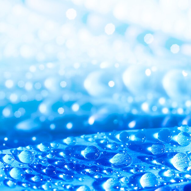 Fondo azul con gotas de agua