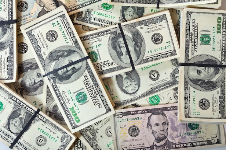 Foto gratuito fondo de billetes de dólares