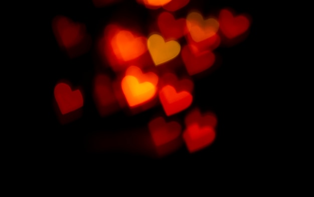 Foto gratuita fondo bokeh corazones rojos