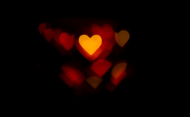 Foto gratuita fondo bokeh corazones rojos