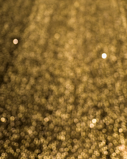 Foto gratuita fondo de bokeh iluminado borroso de oro