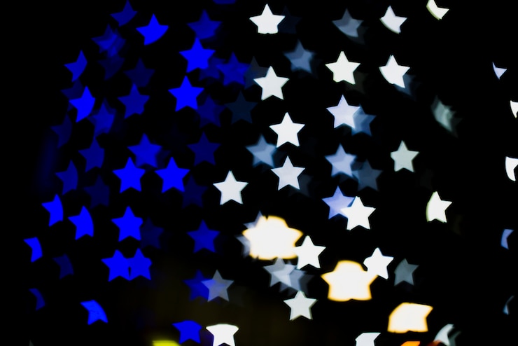 Foto gratuito fondo bokeh con luces en forma de estrellas