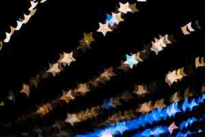 Foto gratuita fondo bokeh con luces en forma de estrellas