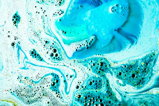 Fondo de bomba de baño de burbuja de cuidado de cuerpo azul