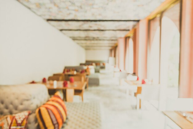Fondo borroso abstracto del restaurante interior - efecto del filtro de la luz del vintage