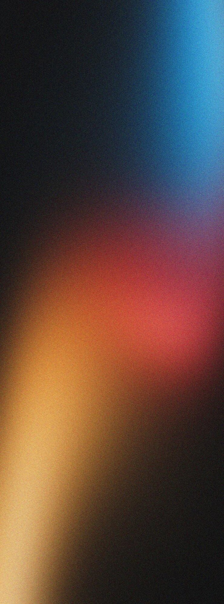 Fondo borroso abstracto con vibrantes tonos naranja rojo y azul