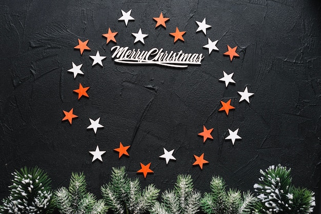 Foto gratuita fondo decorativo de navidad con estrellas formando circulo y letras