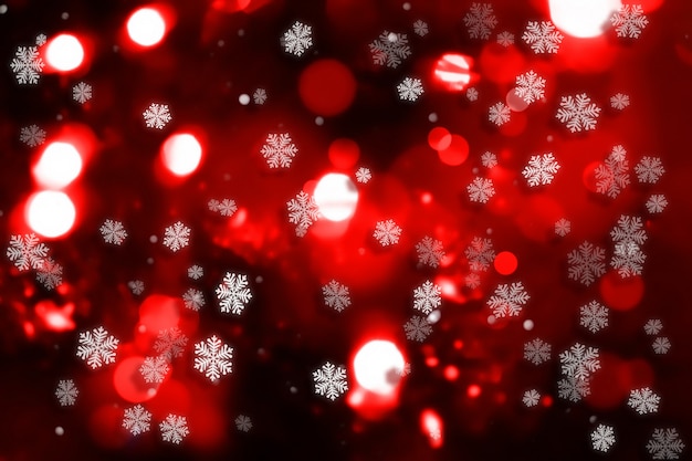 Fondo decorativo de navidad con luces de copo de nieve y bokeh