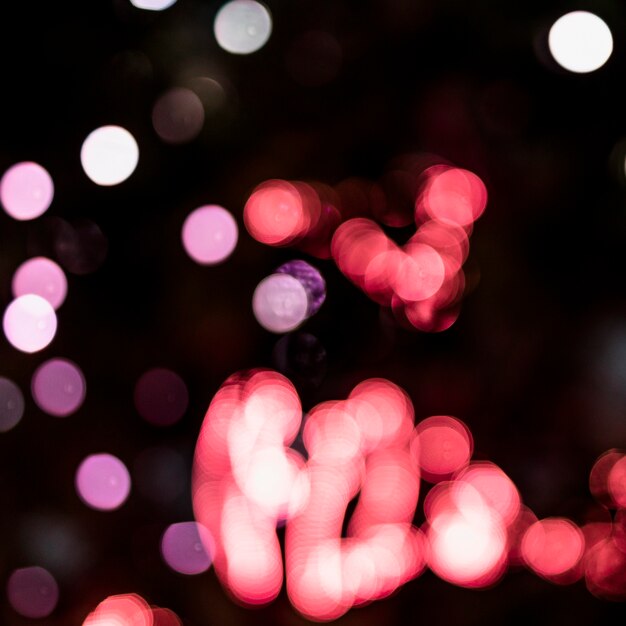 Fondo defocused brillante de vacaciones con luces parpadeantes