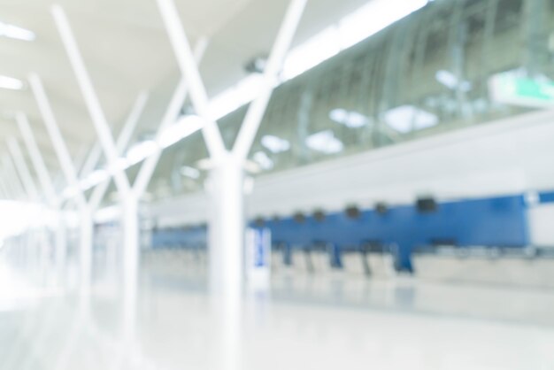 Fondo de desenfoque abstracto: mostradores vacíos de check-in en el aeropuerto