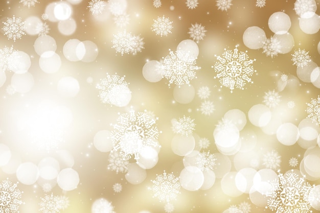 Fondo dorado de Navidad con luces bokeh y diseño de copos de nieve