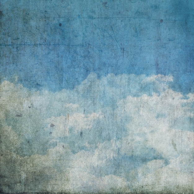 Fondo de estilo grunge con nubes en el cielo