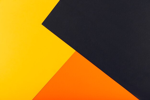 Fondo geométrico amarillo, naranja y negro