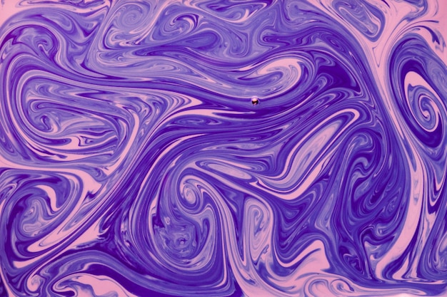 Fondo líquido abstracto azul y rosado mezclado
