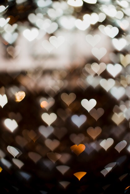 Fondo de luces blancas en forma de corazón