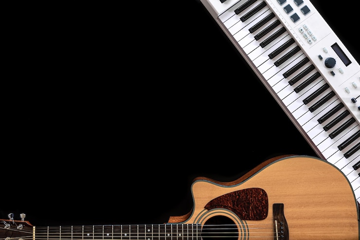 Foto gratuito fondo musical con guitarra acústica y teclas musicales en el espacio de copia negro