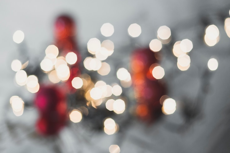 Foto gratuito fondo navideño con luces borrosas