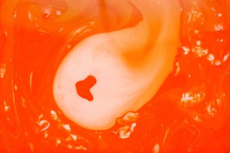 Foto gratuito fondo de pantalla líquido naranja vista superior