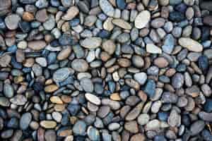 Foto gratuita fondo de pantalla de patrón de textura de piedras de guijarros
