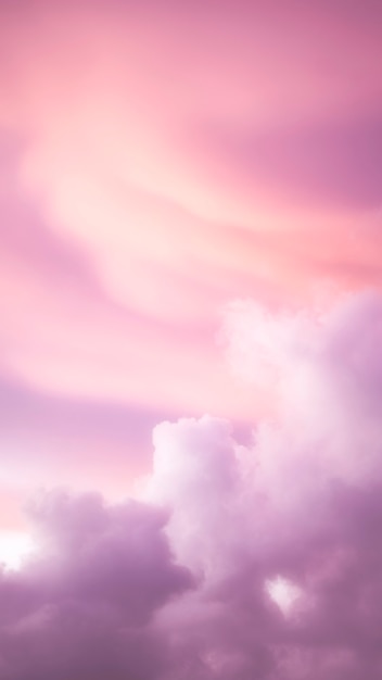 Foto gratuita fondo de pantalla de teléfono móvil cielo nublado rosa