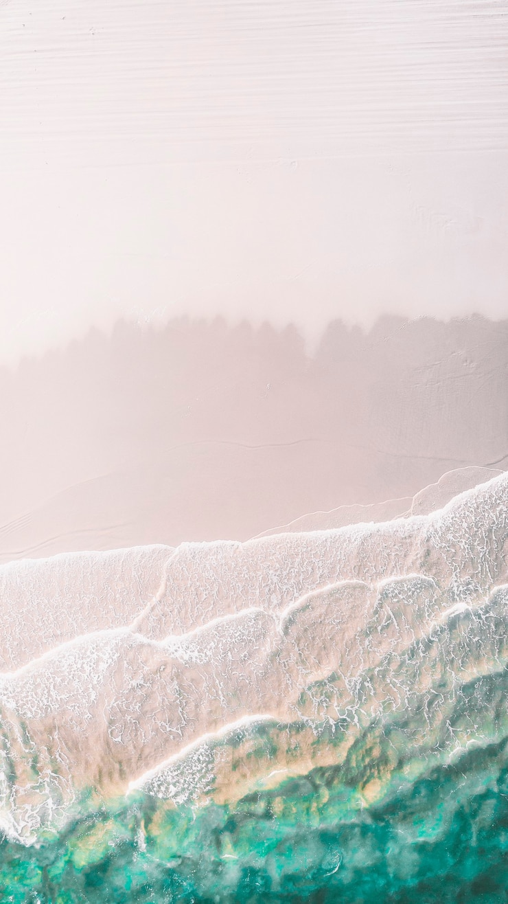 Fondo de pantalla de teléfono móvil de playa de arena blanca