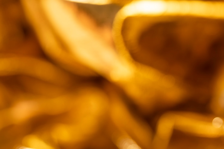 Foto gratuito el fondo de papel dorado arrugado