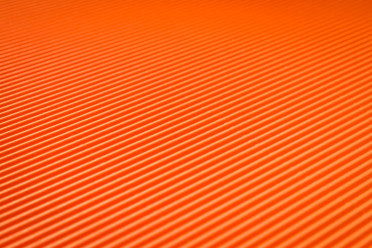 Foto gratuito fondo de papel naranja para el concepto de diferentes orígenes