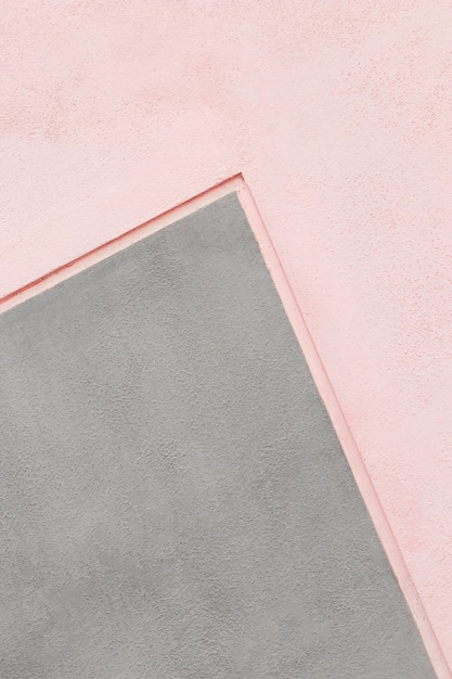 Fondo de pared de estructura gris y rosa