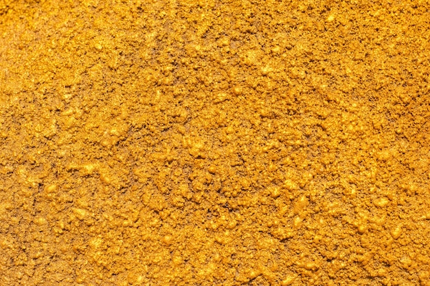 Foto gratuita fondo de la pared de oro