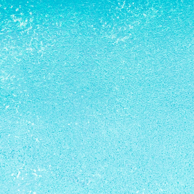 Fondo pintado azul claro monocromático vacío