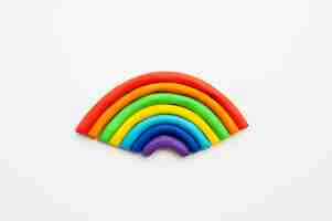 Foto gratuita fondo de plastilina con arco iris plano