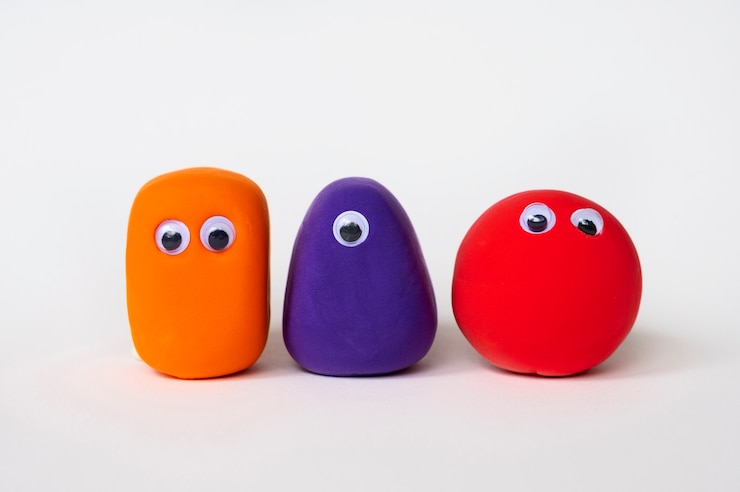 Foto gratuito fondo de plastilina con formas coloridas