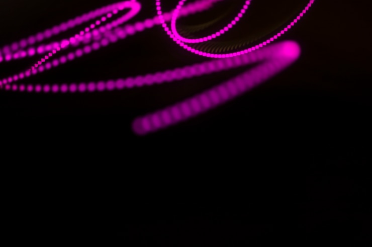 Foto gratuito fondo de rachas de luz neon