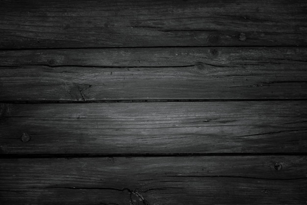 Fondo rústico de madera negra con espacio de copia