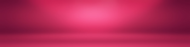 Fondo de sala de estudio rosa claro liso vacío abstracto uso como montaje para exhibición de productos ...