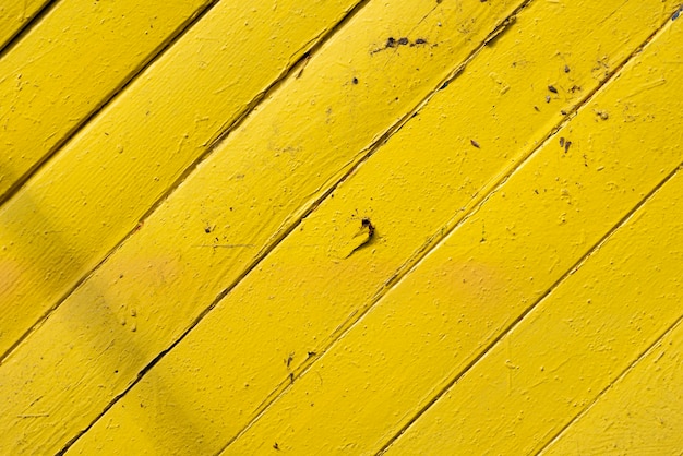 Fondo de tablones de madera amarilla envejecida