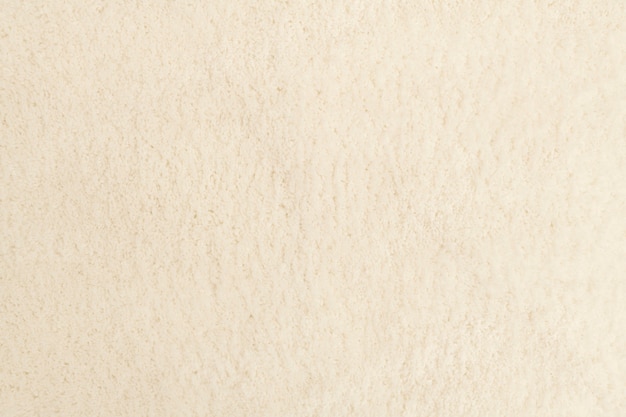 Fondo de tela con textura beige con espacio de diseño