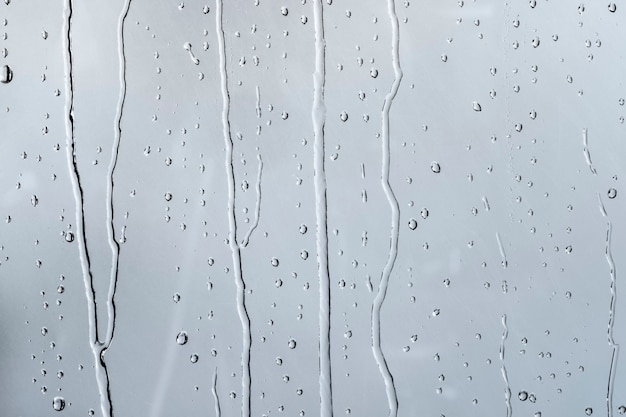 Foto gratuita fondo de textura de agua, ventana lluviosa en día nublado