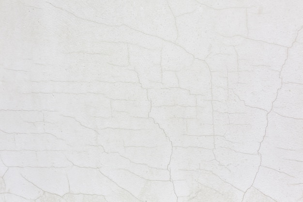 Foto gratuita fondo de textura de estuco de pared agrietada blanca