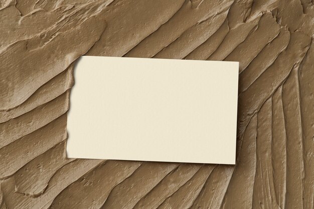Fondo de textura de glaseado marrón con tarjeta de visita