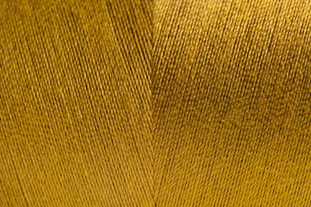 Fondo de textura de hilo laminado dorado