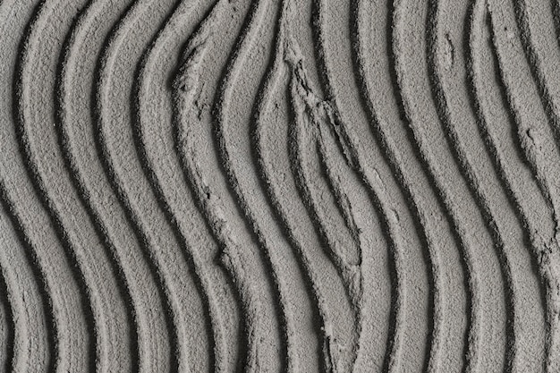 Fondo de textura de hormigón de patrón de onda gris