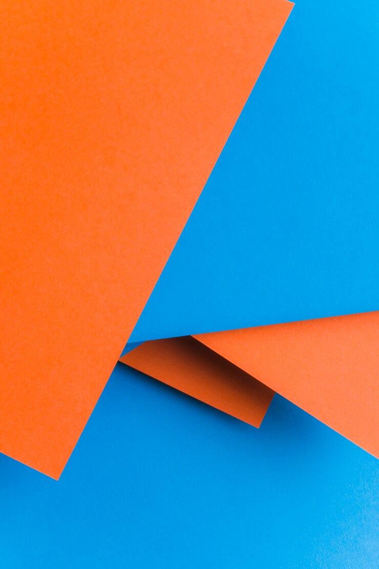 Foto gratuito fondo de textura de papel reciclado en color azul y naranja.