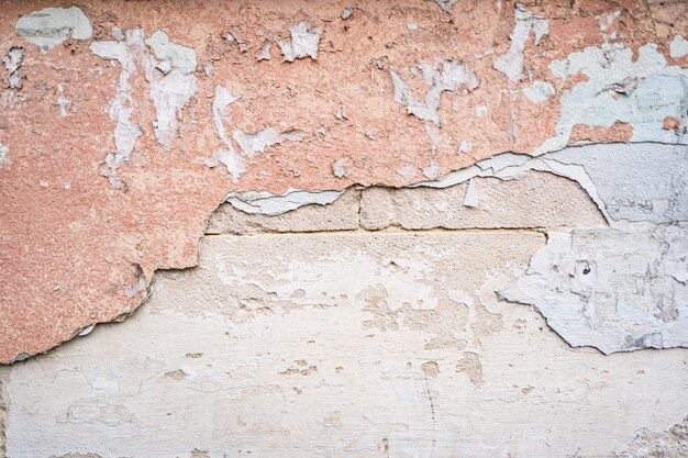 Fondo de textura de pared de hormigón rosa en blanco