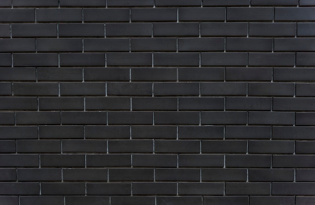 Fondo de textura de pared de ladrillo negro