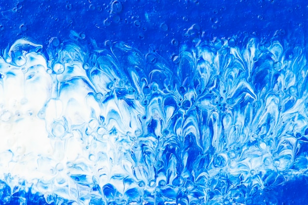 Fondo de textura de pintura de aceite azul y blanco