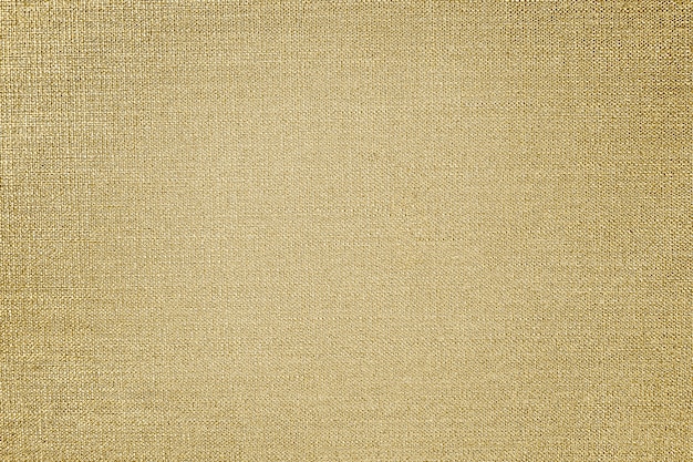 Fondo de textura de tela de algodón dorado