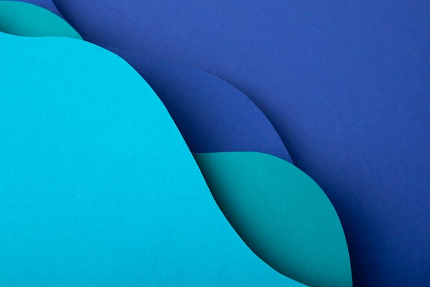 Formas de papel psicodélico en diferentes tonos de color.