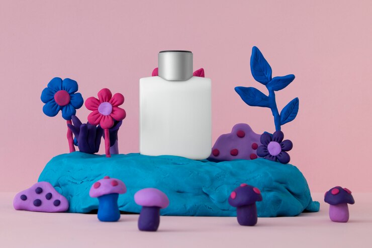 Foto gratuito frasco de perfume a base de ingredientes del suelo.